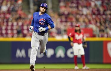 Cachorros golpean a los Rojos con 17 hits en la victoria por 13-4